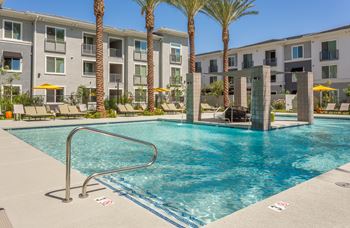Stunning pool & spa with poolside cabanas & seating areas with firepits