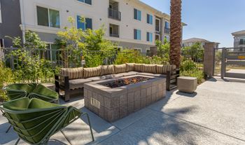 Outdoor entertainment area with lounge areas, outdoor dining & grills