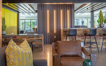 Luxury clubhouse with tvs & entertainment area