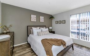 Glendale apartment for rent - a bedroom with a large bed and a window  at Glen Brae, Glendale, AZ