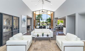 Resident lounge with kitchen, lounge seating & tv