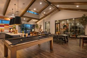 Laveen apartment for rent - a game room with a pool table and a dining area at Weylyn Luxury Apartments, Laveen, Arizona