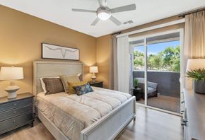 Laveen apartment for rent - a bedroom with a bed and a ceiling fanat Weylyn Luxury Apartments, Laveen, AZ 85339