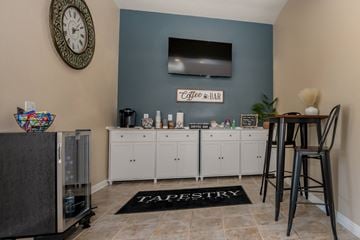Prescott Valley apartment for rent - a living room with a bar and a television