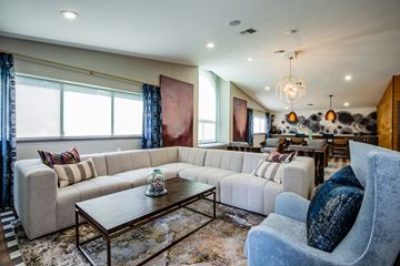 Port Orchard apartment for rent - A living room with a large sectional sofa and a coffee table.
