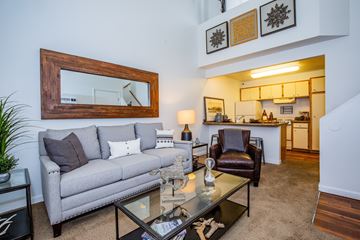 Salt Lake City apartment for rent - A living room with a grey couch and a coffee table.