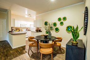 Thornton apartment for rent - A kitchen with a table and chairs in the middle of the room.