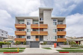 Los Angeles apartment for rent - A modern apartment building with a mix of wood and concrete exterior.