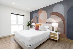 Los Angeles apartment for rent - Modern bedroom with geometric wall mural at Lido - 1532 Brockton Ave Apartments, Los Angeles, 90025