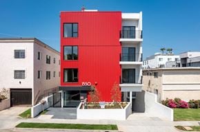 Los Angeles apartment for rent - the red facade of a condo building in a city