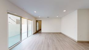 Los Angeles apartment for rent - an empty living room with white walls and wood flooring