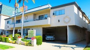 Los Angeles apartment for rent - a car is parked in a garage in front of a house