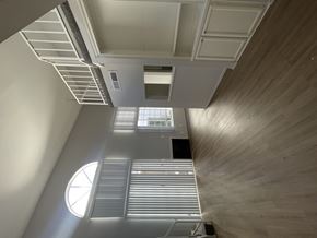 Los Angeles apartment for rent - A modern interior with a staircase and a skylight.