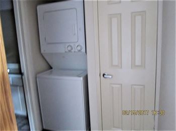 White stackable washer and dryer
