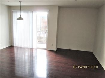 Spacious room with wooden floor