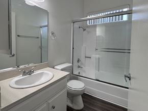 Los Angeles apartment for rent - A white bathroom with a sink, toilet, and shower at 3615 Watseka Ave, Los Angeles, CA, 90034