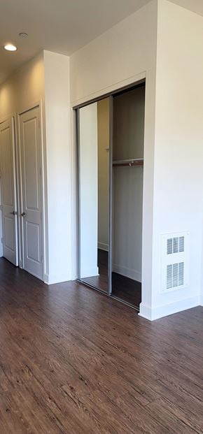 San Luis Obispo apartment for rent - a living room with a hard wood floor and sliding glass doors