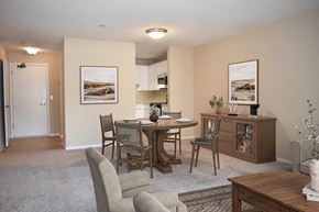 St. Paul apartment for rent - A dining room with a table set for four.