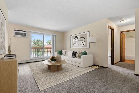 St. Paul apartment for rent - a living room with a couch and a table