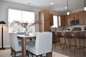 Inver Grove Heights townhouse for rent - A dining room with a table and chairs.