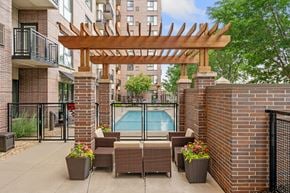 Bloomington apartment for rent - our apartments have a large patio with furniture and a pool