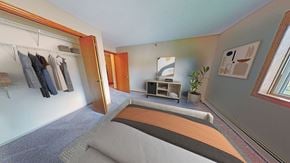 Hopkins apartment for rent - a bedroom with a bed and a closet
