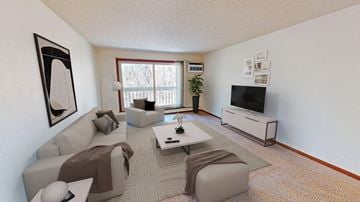 Eagan apartment for rent - a living room with a couch and a coffee table and a tv