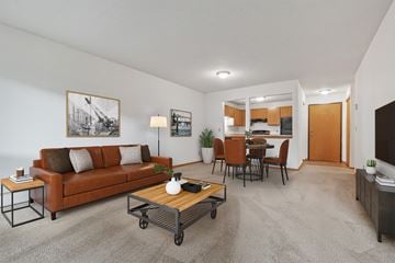 Plymouth apartment for rent - the living room of an apartment with a couch and a coffee table