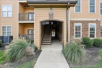 Murfreesboro apartment for rent - A building with a staircase leading to the entrance.