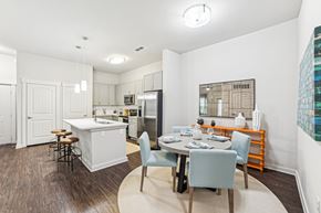 Charleston apartment for rent - A kitchen with a dining table and chairs at Proximity Apartments, South Carolina, 29414