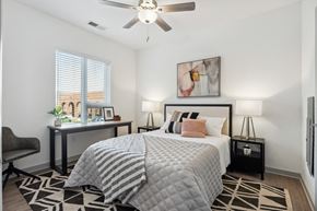 Hampton apartment for rent - a bedroom with a large bed and a ceiling fan at The Constellation Apartments, PRG Real Estate, Hampton, Virginia