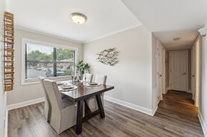Charleston apartment for rent - A dining room with a table and chairs at Sawgrass Apartments, South Carolina