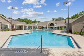 Winter Garden apartment for rent - the preserve at ballantyne commons pool and resort style building with a swimming pool  at Palm Crossing, Winter Garden
