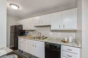 Charleston apartment for rent - Kitchen With White Cabinetry And Appliances at Planters Trace, South Carolina, 29414