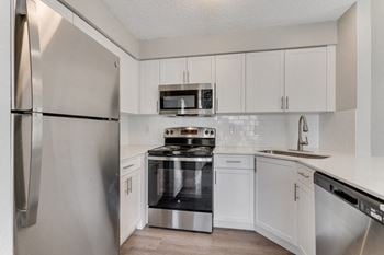 The preserve at ballantyne commons apartment kitchen with stainless steel appliances