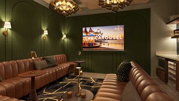 A cinema room with a large screen and a row of seats