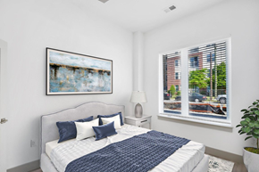 Norfolk apartment for rent - a bedroom with a large bed and two windows at The Point Apartments on 38th, Norfolk, VA