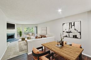 Greenville apartment for rent - A dining room with a wooden table and chairs at Beacon Ridge Apartments, PRG Real Estate Management, Greenville, 29615