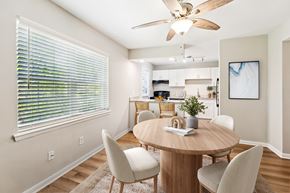Hampton apartment for rent - A dining room with a round table and chairs at Rivers Landing Apartments, Hampton, Virginia