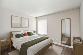 Kansas City apartment for rent - a bedroom with a bed and a mirror at The Reserve At Barry Apartments, Kansas City, MO, 64154