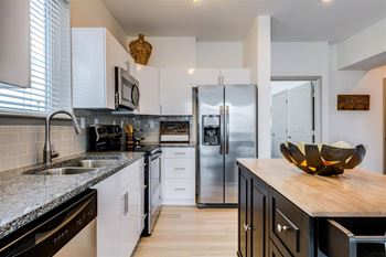 Kitchen with white cabinets