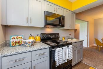 Kitchen with white cabinets