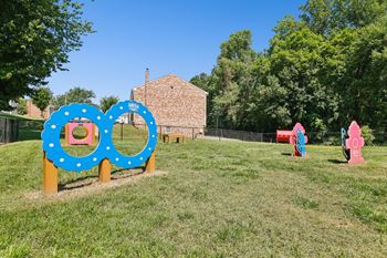 Gated bark park with canine agility course