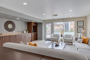 Mesa apartment for rent - A living room with a white couch and a coffee table.