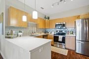 San Antonio apartment for rent - Model Kitchen | Backsplash | Stainless Steel Appliances at Mission Hills Apartments, Texas, 78258