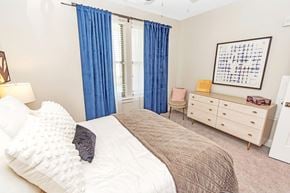 Charlotte apartment for rent - Bedroom with a dresser at Pointe at Research Park Apartments, Charlotte, North Carolina