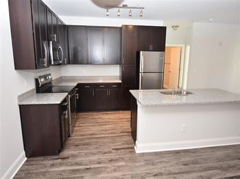 Spacious kitchen island with farmhouse sink
