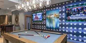 Gaming and entertainment lounge with pool table