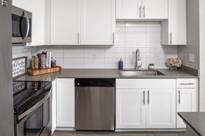 Morrisville apartment for rent - White kitchen at Pointe at Lake Crabtree Apartments, Morrisville, 27560