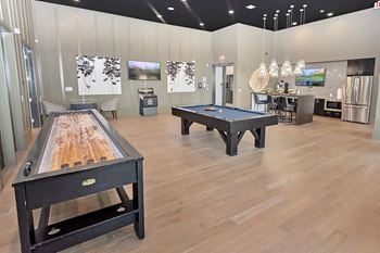 Sports lounge with billiards and gaming table
